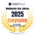 Circular award badge with HOSTtest logo, Webhoster des Jahres 2025 text, orange easyname, and yellow laurel wreaths.